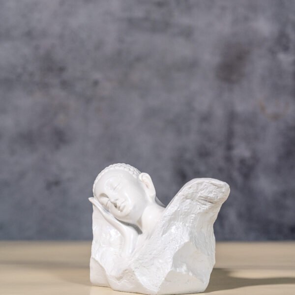 Exquisite White Marble Statue Depicting Buddha in a Serene Meditative or Resting Pose, Symbolizing Peace and Enlightenment