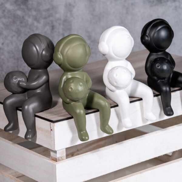 Minimalist Four Nordic-Inspired Ceramic Little People Figuriness, Holding a Spherical objects