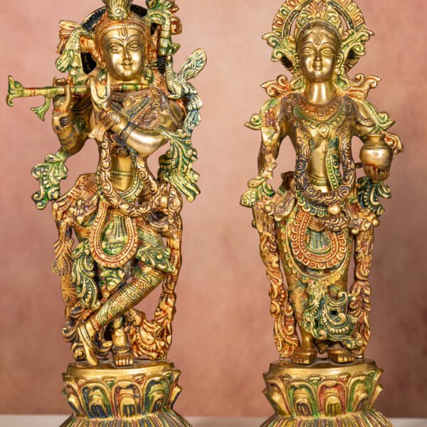 Exquisitely Crafted Brass Statues of Hindu Deities, Featuring Lord Krishna Playing the Flute Alongside a Divine Consort, Adorned with Intricate Detailing and Traditional Attire