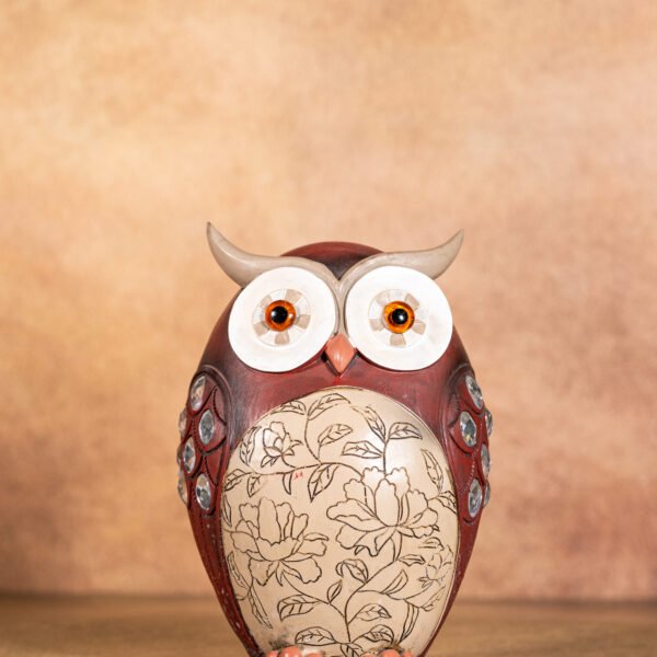 A Decirative polyresin Ornate Purple Owl Figurine with Floral Pattern and Embellishments