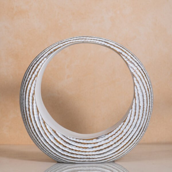 Modern Abstract Seashell-Inspired Round Decor Accent with Textured Ridges