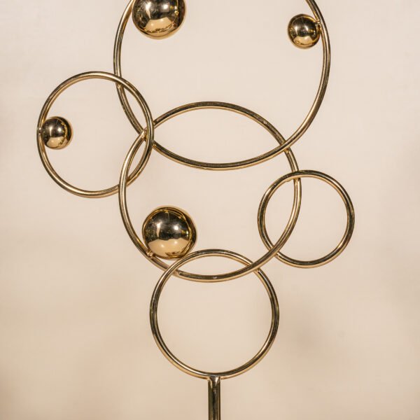 Eternity Berlin Marble Base Metal Ring Table Accent with Interconnected Chrome Rings and Spheres"