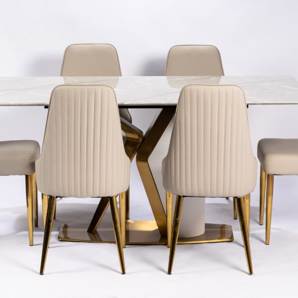 Modern Beige Upholstered Dining Chairs with Elegant Gold-Tone Metal Legs and Horizontal Stitching Detail, Perfect for Contemporary Dining Spaces